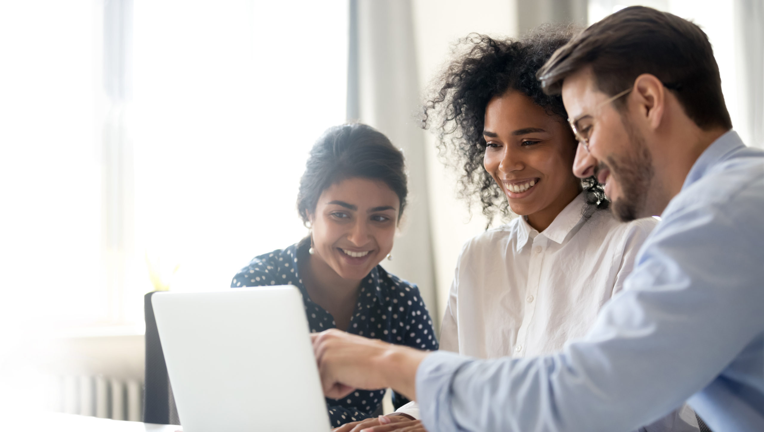 Work team at computer