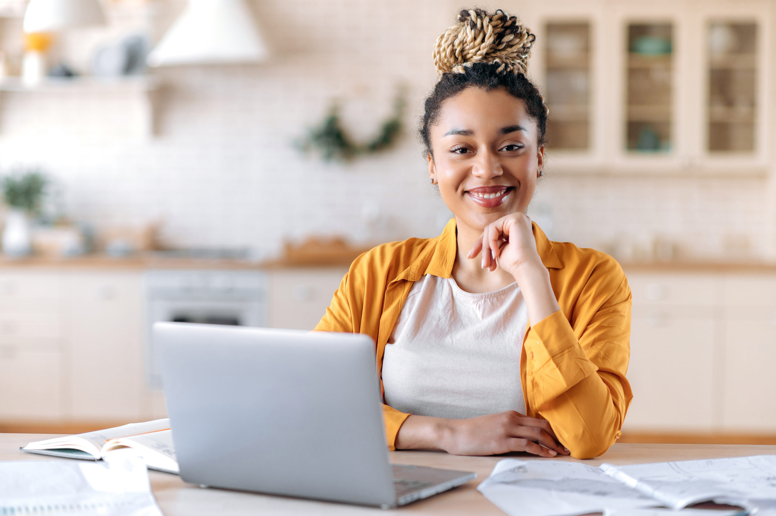 Optimistic woman at computer